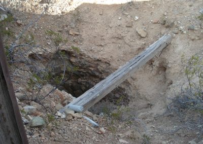 Mine Entry with a wooden bar across it
