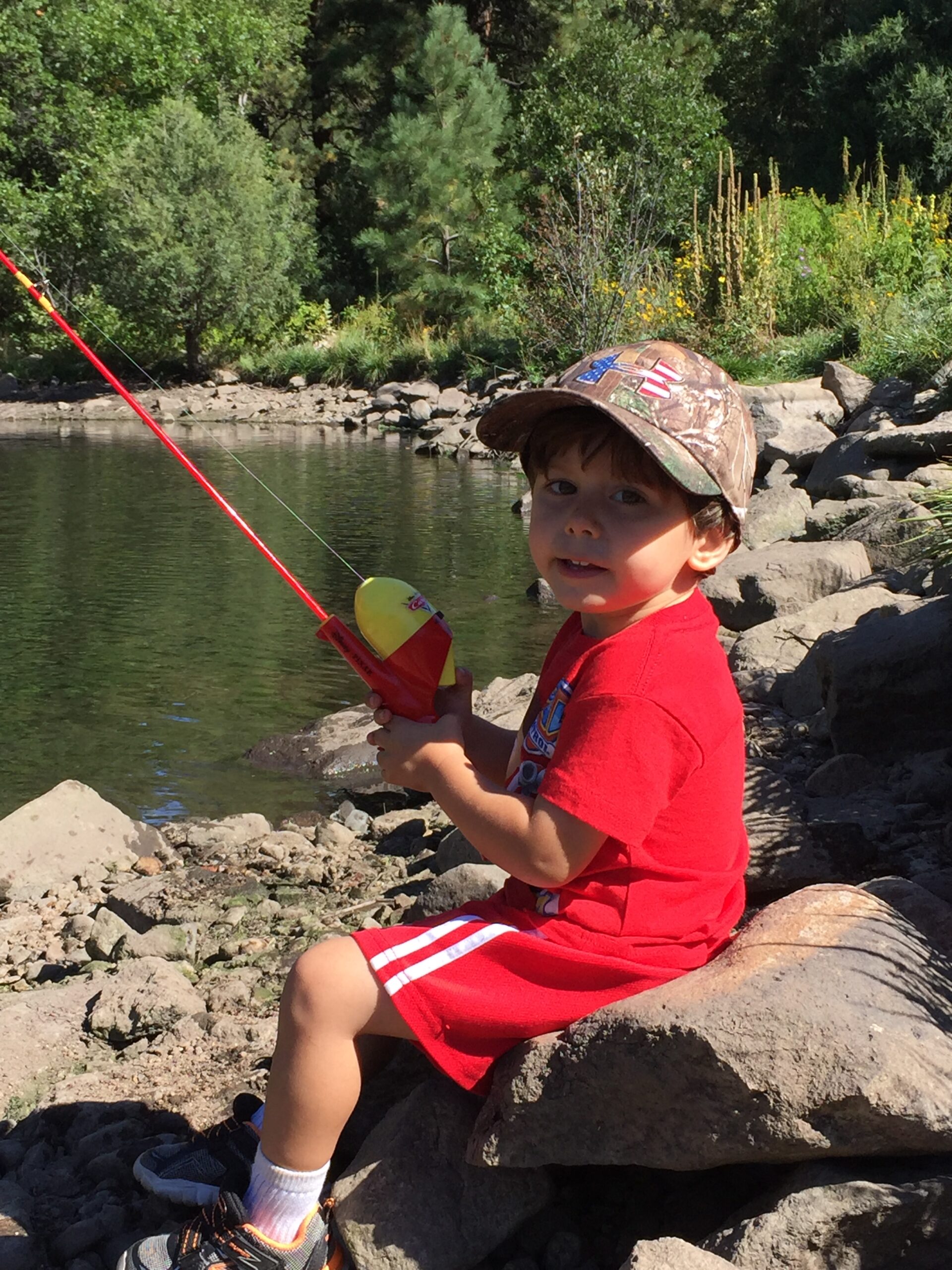 Child fishing at Cimarron Canyon State Park