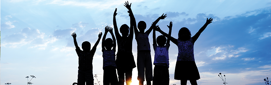 Kidsnparks_banner Silhouettes of children against sky, arms raised